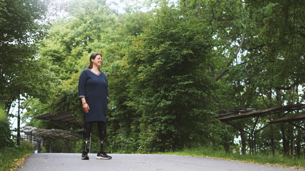Bi-lateral amputee on a sidewalk wearing the Motion Foot SLX.