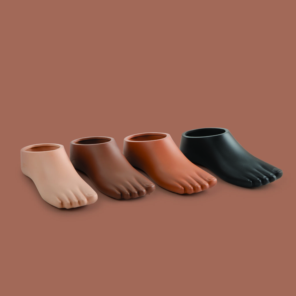 Low profile foot shell, in tan, brown, dark brown, and jet black.