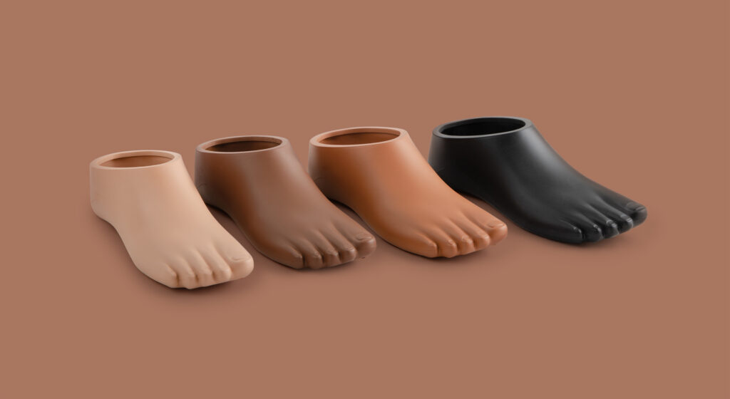 Low profile foot shell, in tan, brown, dark brown, and jet black.